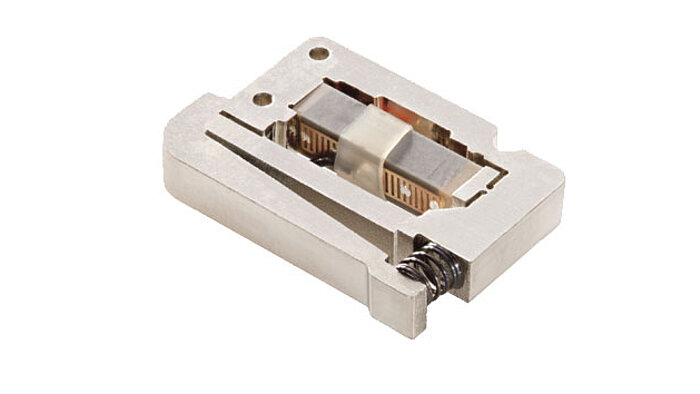 P-604 Low-Cost, Piezo Flexure Actuator Flexure-guided and motion-amplified piezo ceramic actuators provide longer displacement ranges compared to piezo stacks in a more compact package. They are designed with protective preloads and several types of integrated flexure-guiding mechanisms are feasible depending on the guiding precision required in the application.